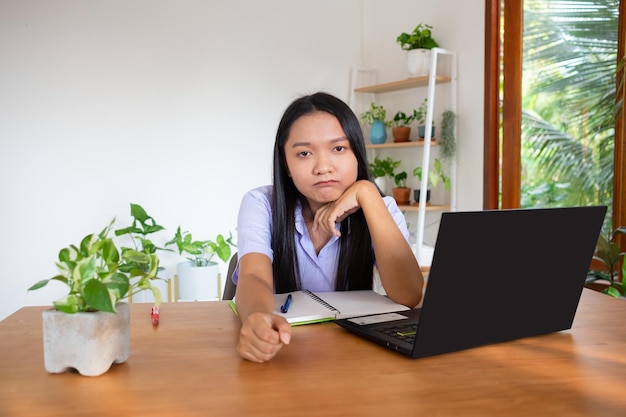 Student girl study by slfe on laptop in room