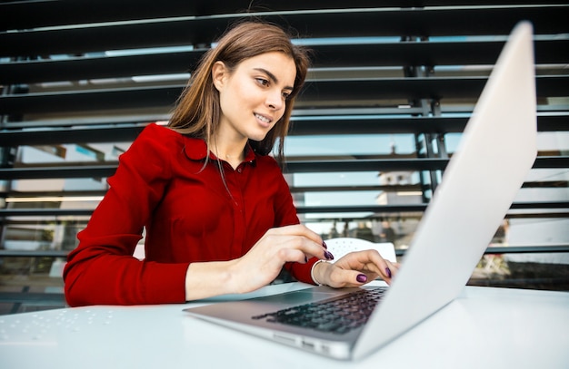 Student Girl Works with Computer