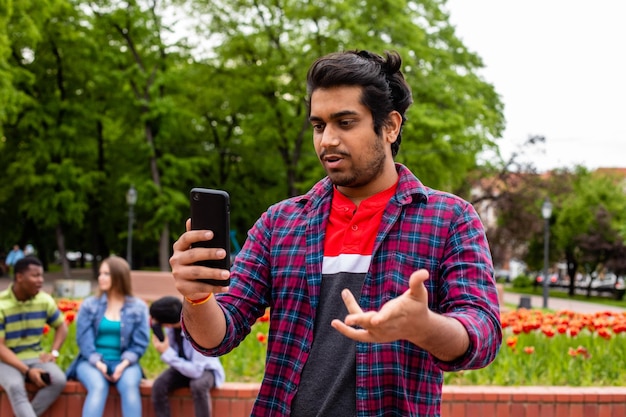 Student having online call with his family