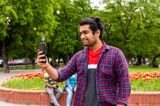 Student having online call with his family