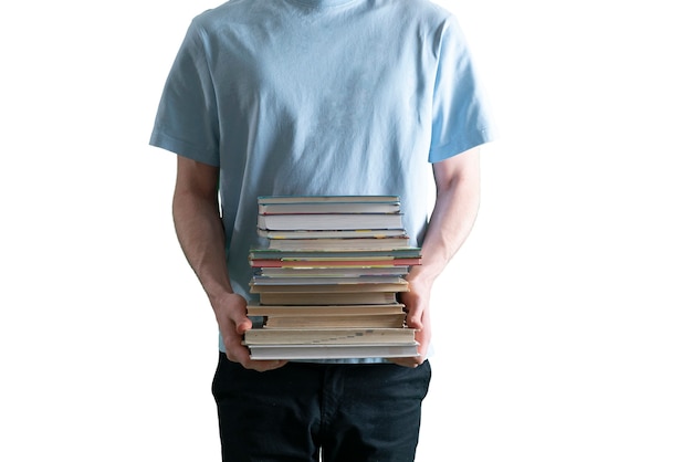 A student holding stack of books, carry heavy paper textbooks, motivation concept, isolated white background