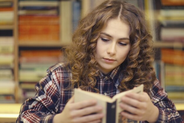 student in a library portrait