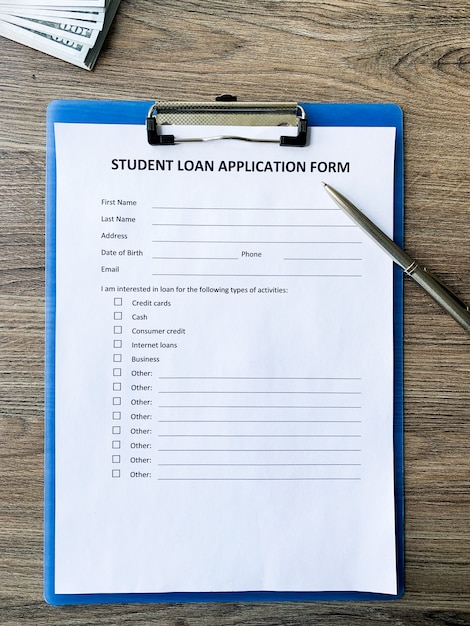 Student loan application form document on table