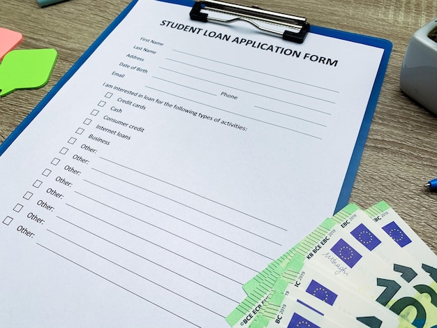 Student loan application form document on table