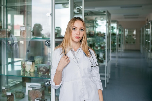 A student of the medical university in the anatomical museum a\
future nurse in the office of a nursing school