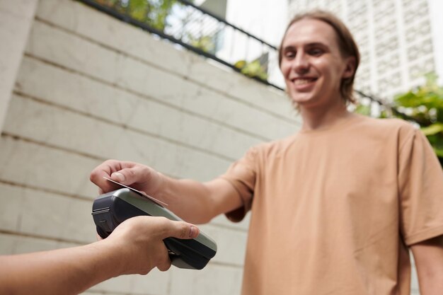 Student Paying for Food Delivery