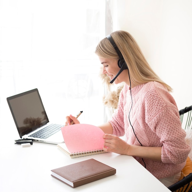 Student in pink blouse e-learning concept