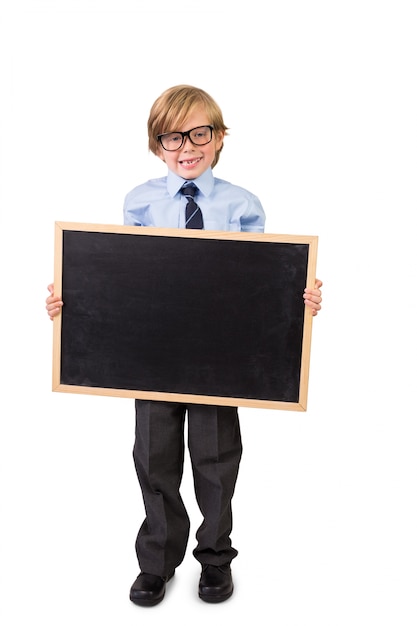 Student smiling and holding blackboard