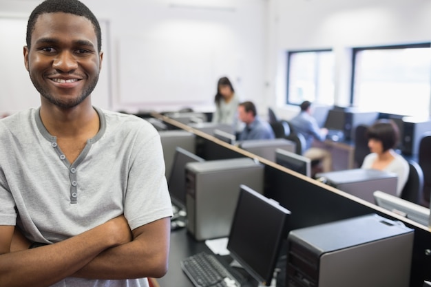 Student standing in computer room