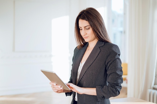 The student studies the basics of economics Online training in a modern office