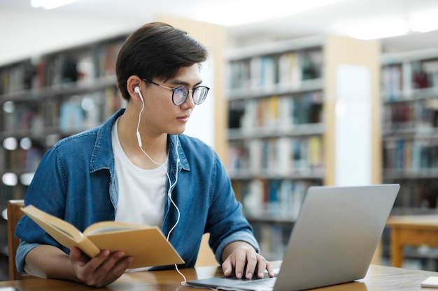 student studying at library