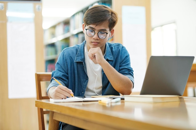 Student studying at library