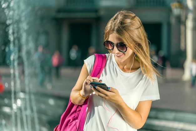 Student Tourist Girl with Phone in Hands