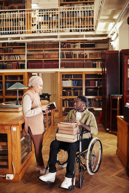 Student in Wheelchair Talking to Friend