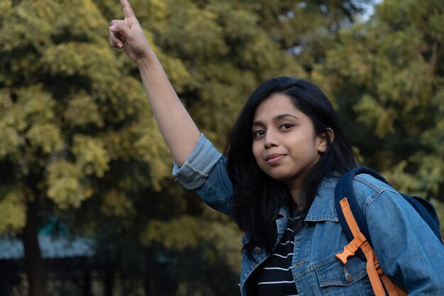 Student with bag trying to fly