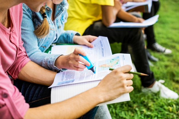 Students doing homework in the park