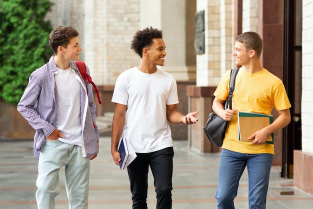 Students going to classes having break outdoors and chatting
