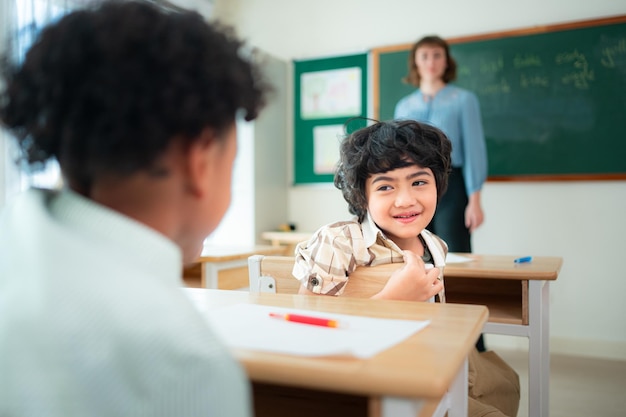 students learn and study in a classroom of school where youngsters sit and play