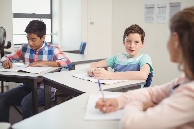 Students studying in classroom