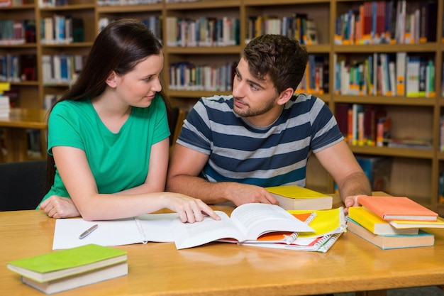 Students studying together in the library