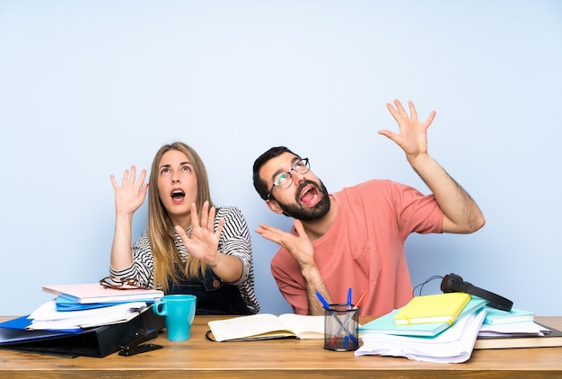 Students with many books nervous and scared