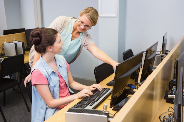 Students working on computer together