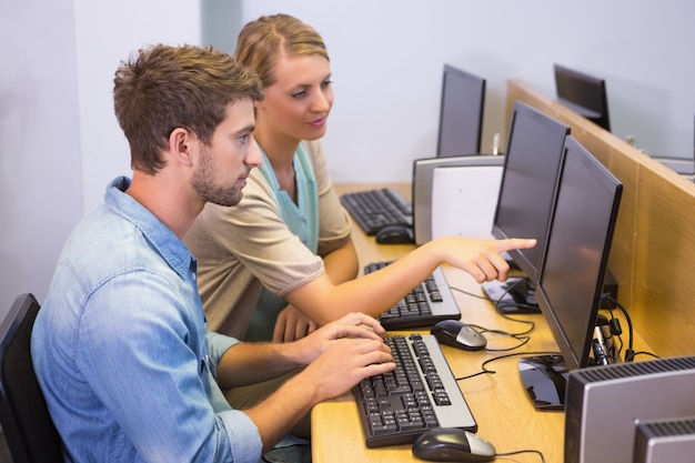 Students working on computer together