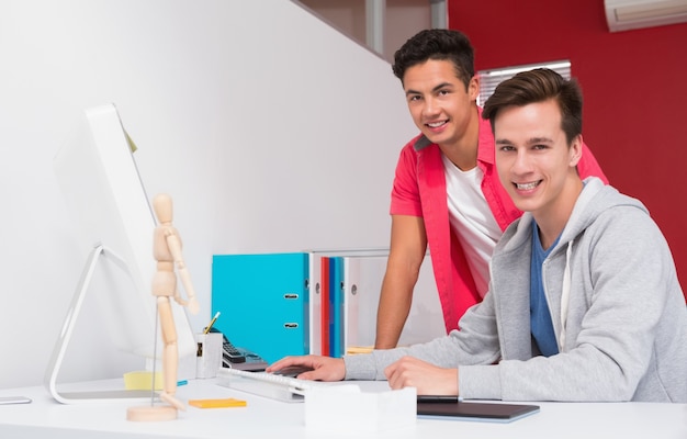 Students working together on computer