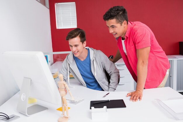 Students working together on computer