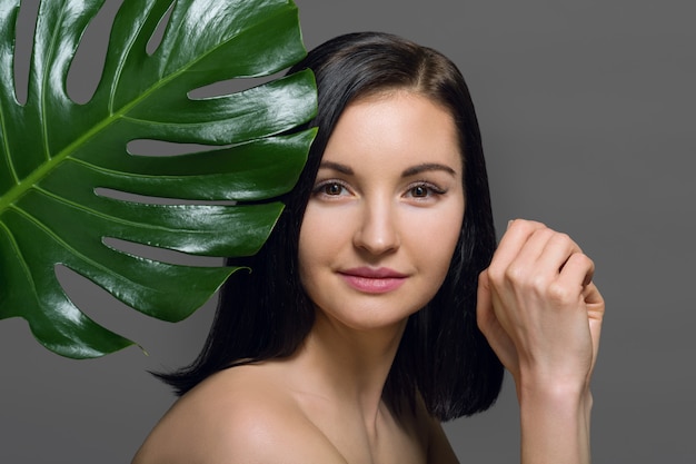 Studio beauty portrait of young brunette