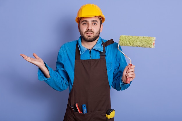 Studio die van voorman is ontsproten die blauw overhemd draagt