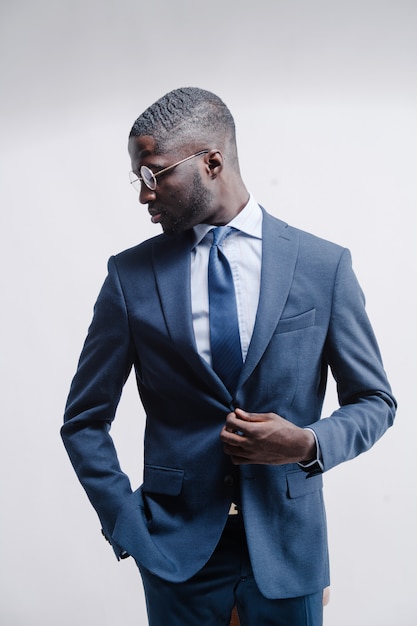 Studio fashion portrait of a handsome young African American businessman