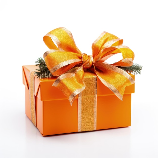 Studio photo of a gift box with gold ribbon