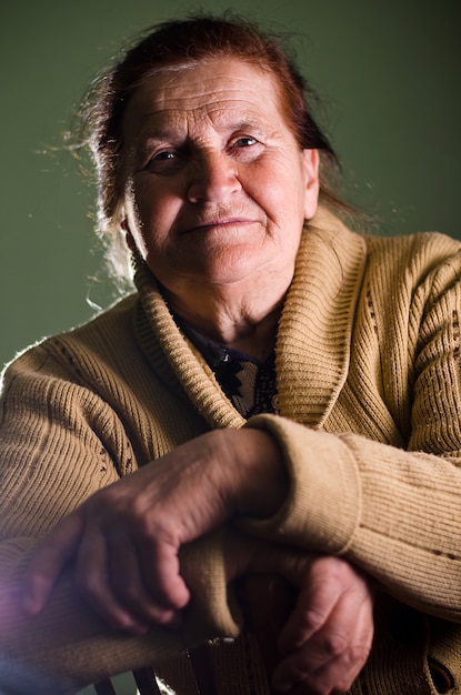 Studio portrait of a beautiful old woman