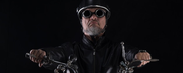 studio portrait of a biker