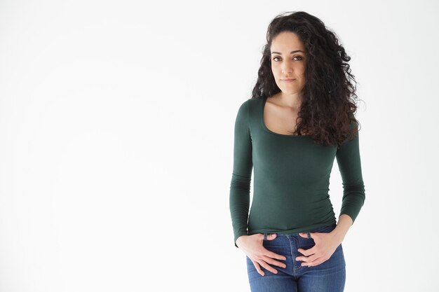 Studio portrait of brunette girl on white background