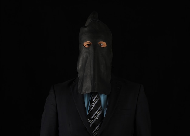 studio portrait of businessman executioner