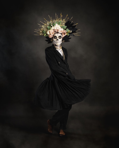 Studio portrait of Drag Queen catrin Catrin dressed in black with flower crown