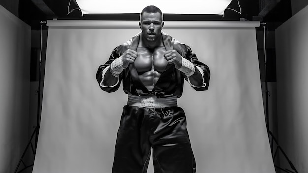 Studio portrait of fighting muscular man