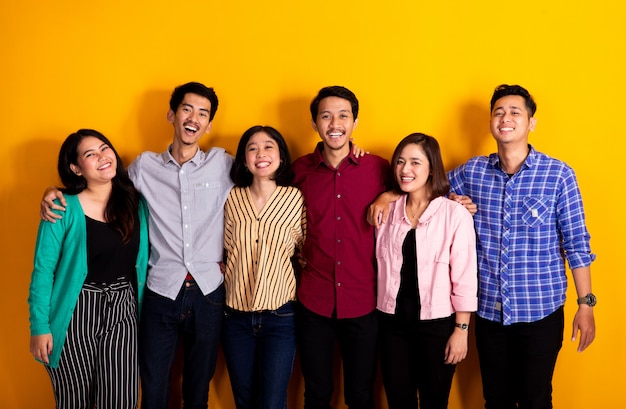 Studio portrait of group of asian young friends looking at camera