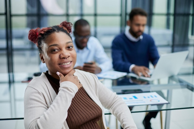 Studio portrait of happy successful confident black business woman