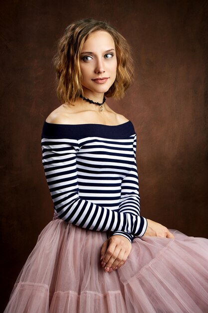 Studio portrait of a young adult woman