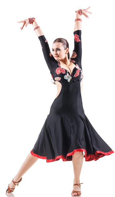 Studio portrait of young attractive woman dancing flamenco