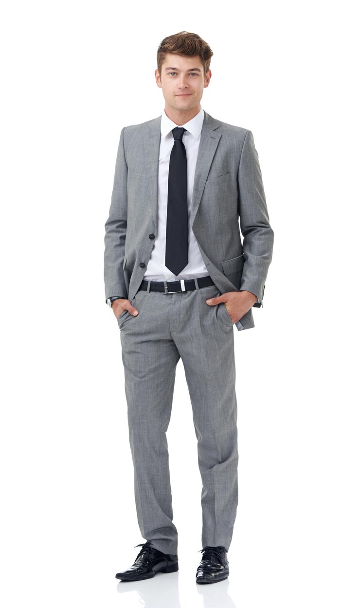 Photo studio portrait or young businessman with ambition in career or professional attorney by white background lawyer positive or face with pride for law job mock up or hands in pocket of fashion suit