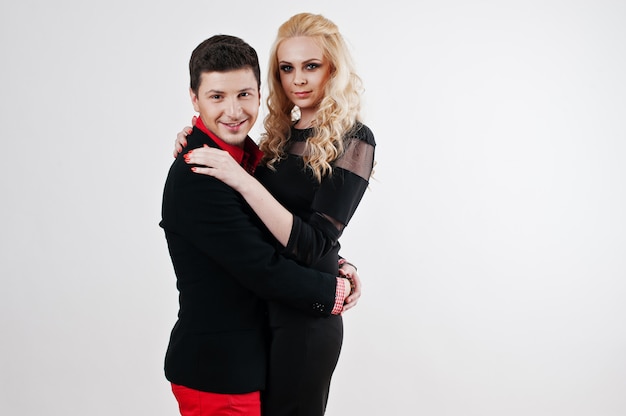 Studio portrait of young stylish beautiful couple in love