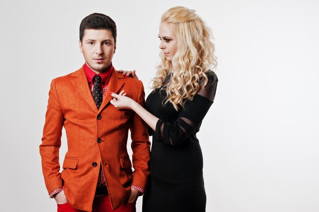 Studio portrait of young stylish beautiful couple in love