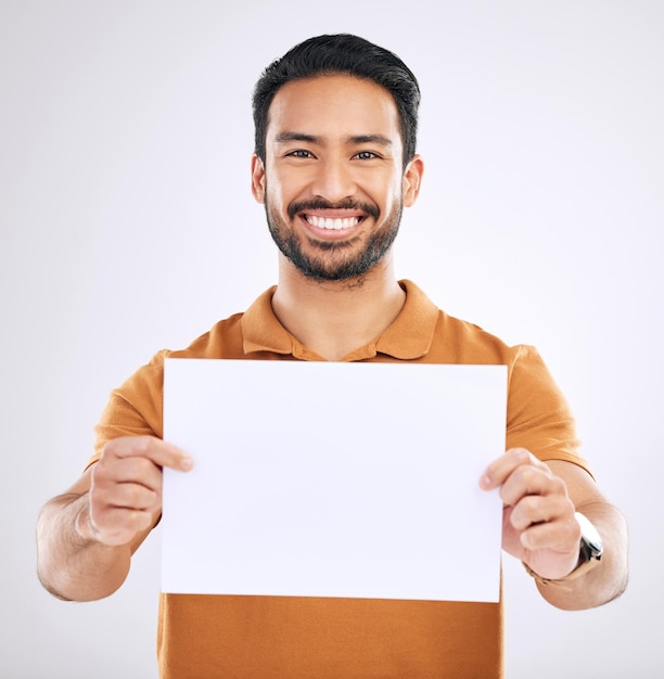 Studio poster portrait or mockup of happy man marketing placard or advertising banner on product placement paper Logo mock up billboard promotion sign or brand person isolated on white background