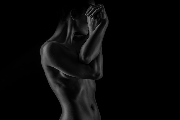 Studio shooting with backlight Sexy body healthy female body concept in black and white