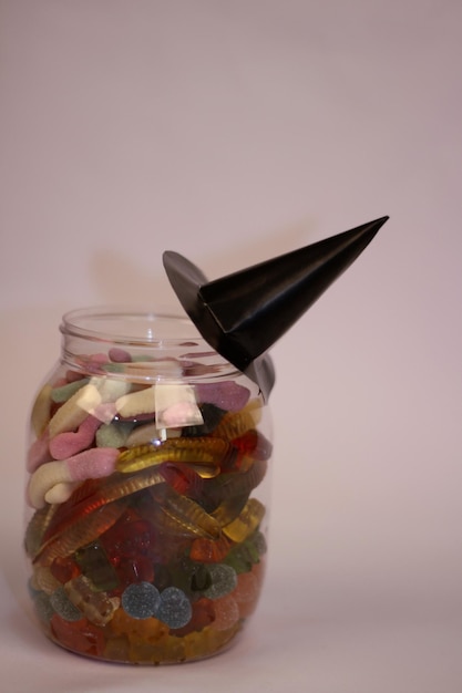 Photo studio shot of assorted candies in jar