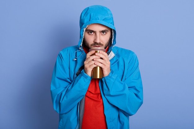 Studio shot of attractive young man with beard